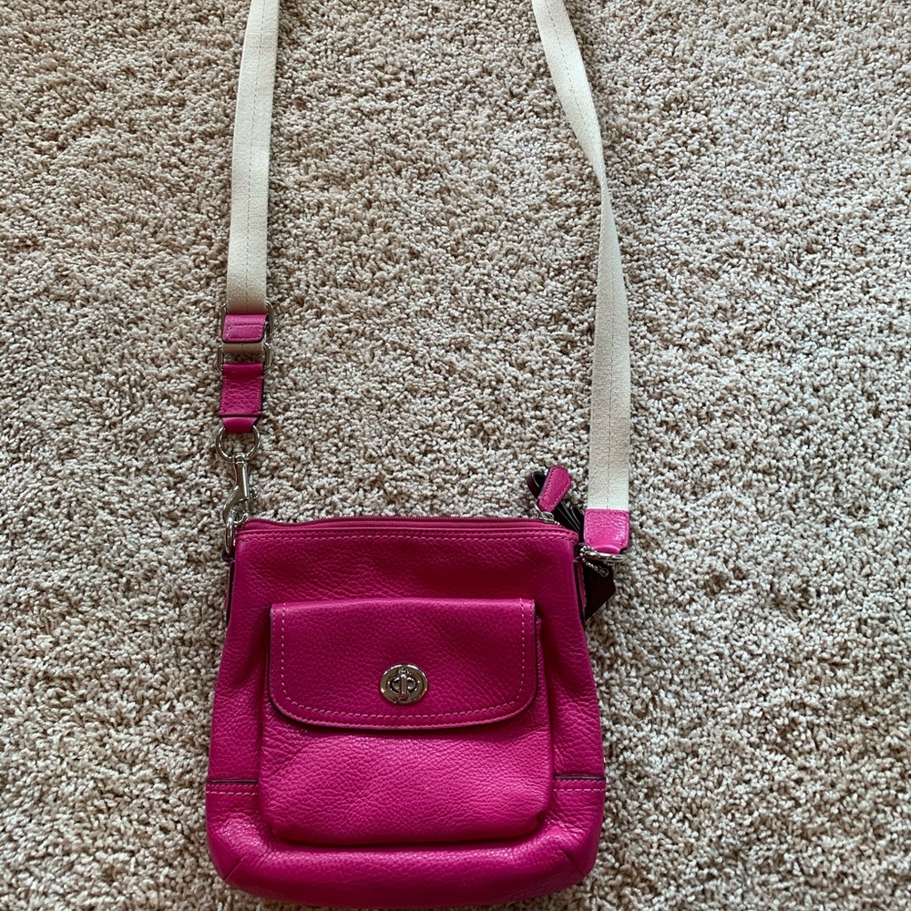 Coach hot pink purse with tan strap